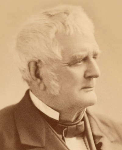 Portrætfoto af John Deere i ældre sepiatone