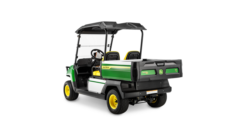 En John Deere Gator GS elektrisk model set bagfra i en vinkel, der viser lad og to sæder under et sort tag.